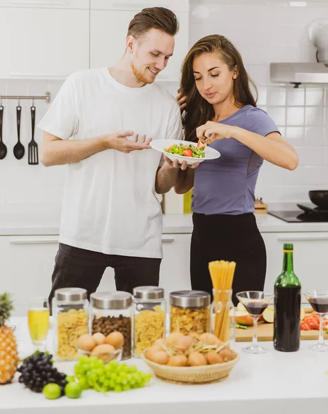 Positive Couple Plate Tasty Fresh Salad Standing Table Assorted Products — Stock Photo, Image