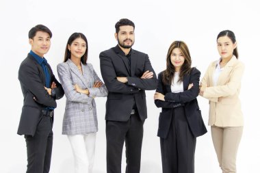 Studio shot group of millennial Indian Asian cheerful professional successful male female businessman businesswoman in formal suit standing smiling crossed arms posing together on white background.