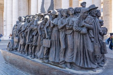 A statue (Angels Unawares) temporarily standing in Rome's St. Peter's Square