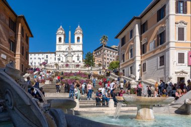From the Spanish steps you have a nice view of The church Trinita dei Monti with in front the Sallustiano Obelisk in Rome