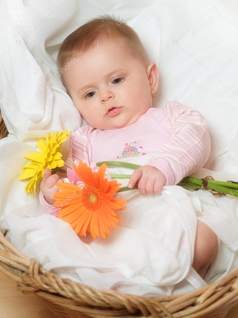 Baby With Flowers Stock Photo By ©fiamoli 16935743