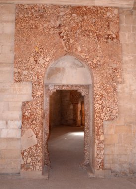 Castel del Monte. The remains of the marble paneling around the door. clipart