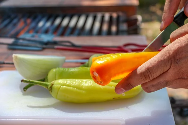 Cooking peppers and onions — Stock Photo, Image