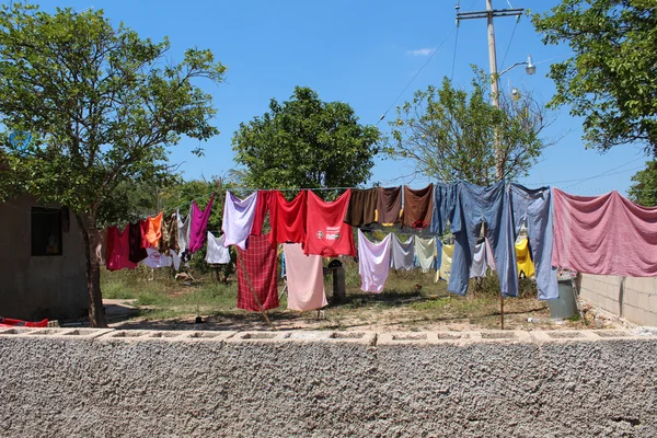 Clothes drying in the wind on a traditional Yucatan town — Stock Photo, Image