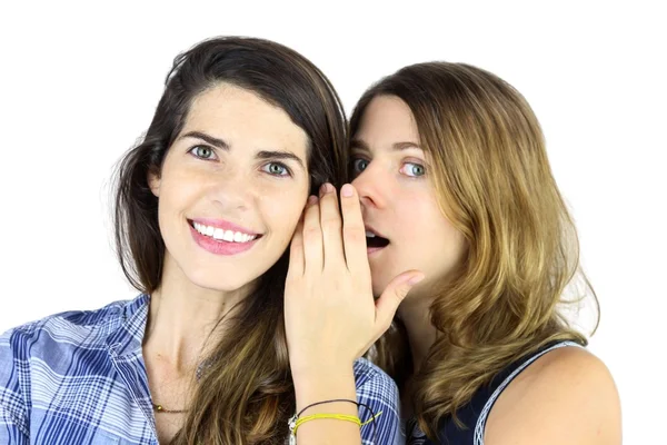 Két lány mondani egy titkot, pletykás nő, gyönyörű, — Stock Fotó