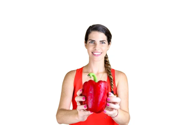 Kvinna med mat, med en stor peppar — Stockfoto
