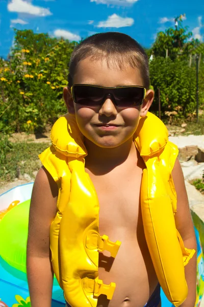 Little boy in a lifejacket — Stock Photo, Image