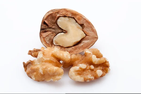 Open walnuts on white background — Stock Photo, Image