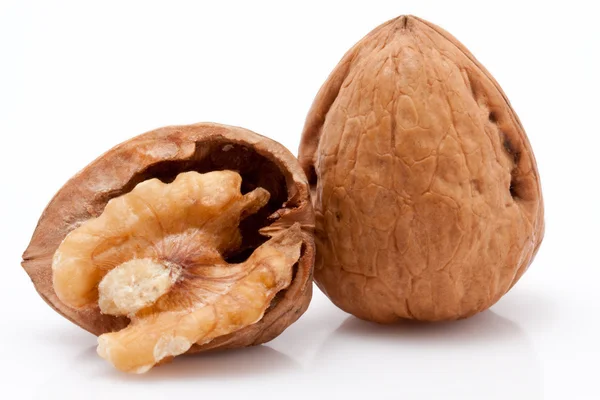 Open walnuts on white background — Stock Photo, Image