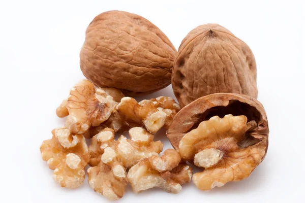 Open walnuts on white background — Stock Photo, Image