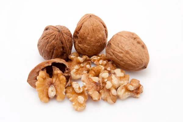 Open walnuts on white background — Stock Photo, Image