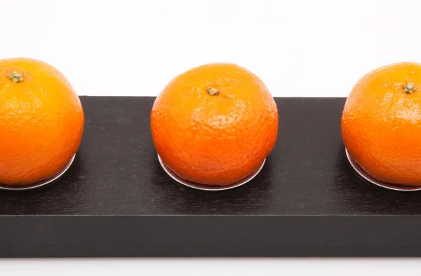 Row of mandarines on white background — Stock Photo, Image