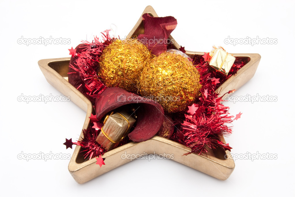 Star shaped dish with christmas bubble and christmas decoration