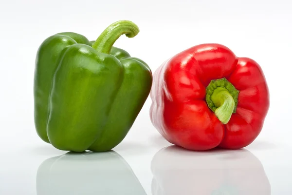 Red and green pepper isolated on white background — Stock Photo, Image
