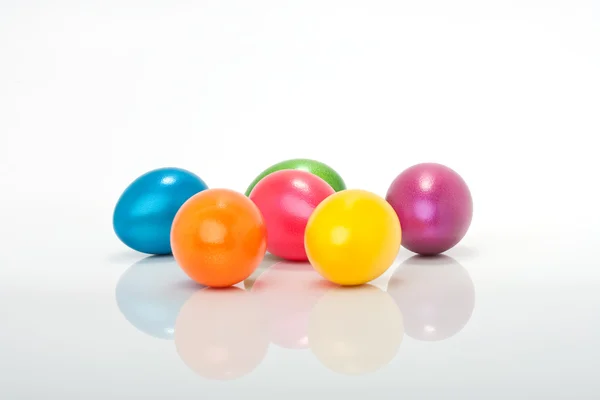 Lot of colorful easter eggs isolated on white background — Stock Photo, Image