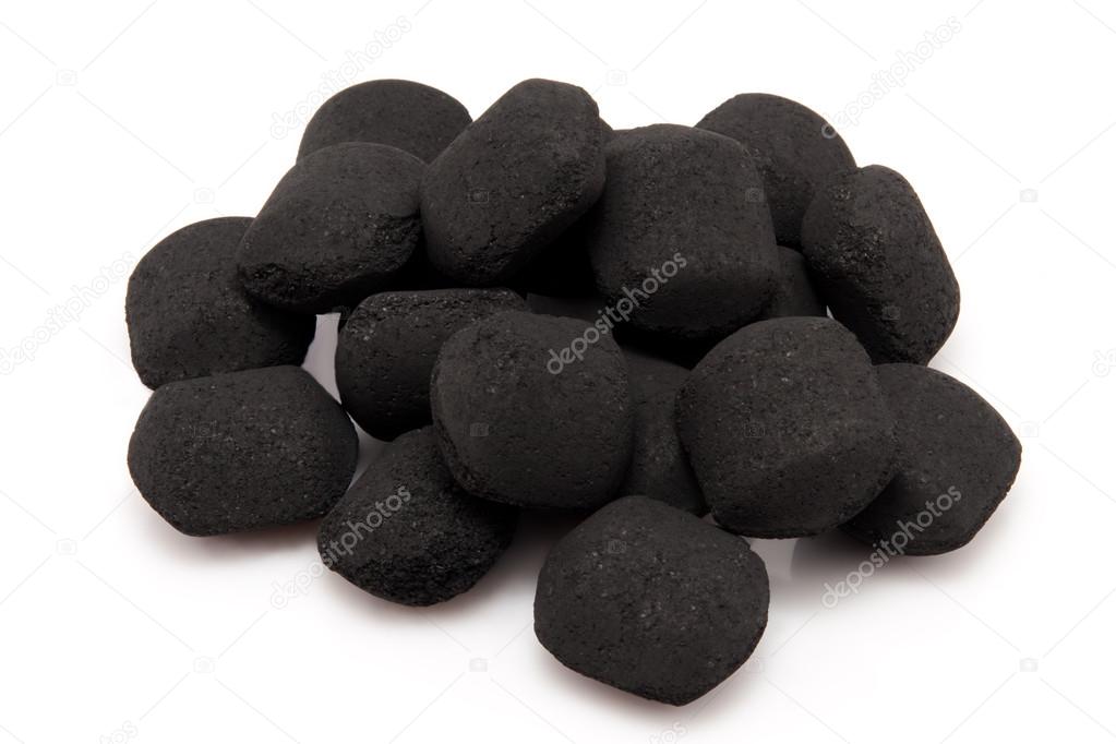 Heap of coals isolated on white background