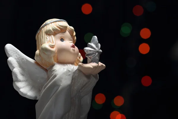 Christmas angel with star and lights — Stock Photo, Image