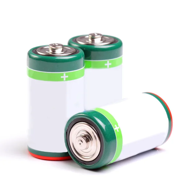 Drei Batterien auf weiß — Stockfoto