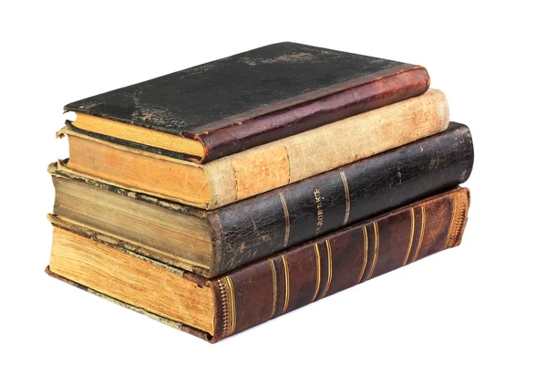 Beyazda izole edilmiş bir yığın eski kitap