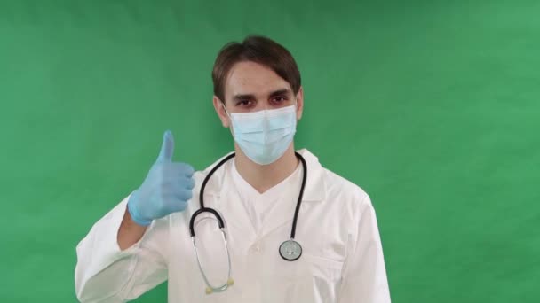 Porträt Eines Arztes Weißem Mantel Und Maske Mit Blauen Handschuhen — Stockvideo