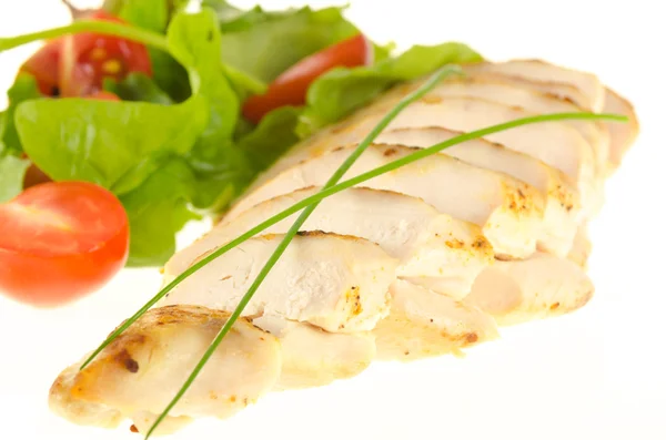 Fried chicken fillet with green chives and salad on white — Stock Photo, Image