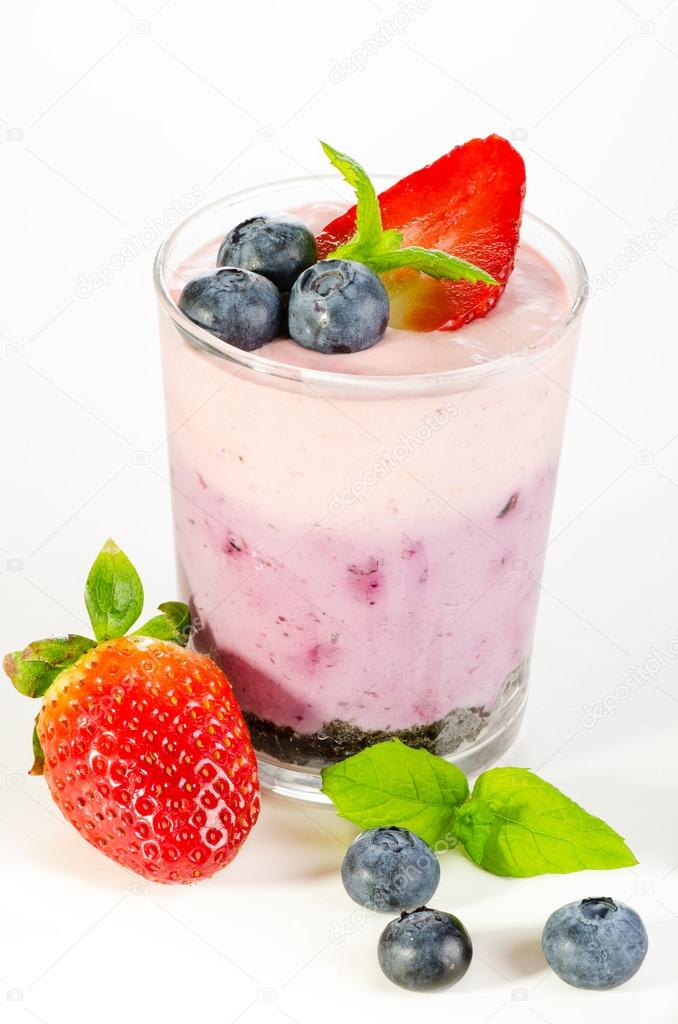 Fruit dessert with berries served in glass
