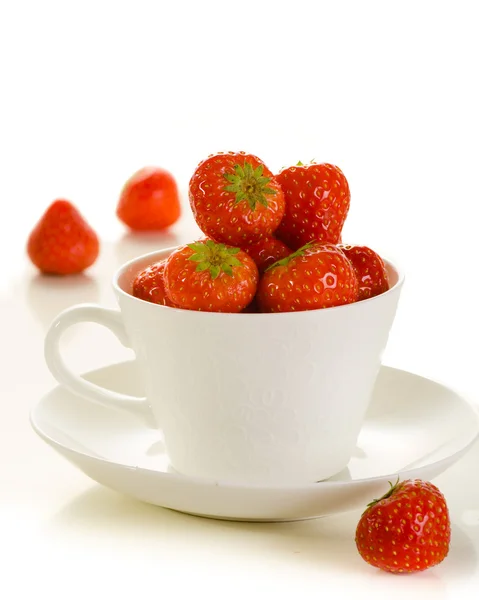 Fresh strawberries in white cup — Stock Photo, Image