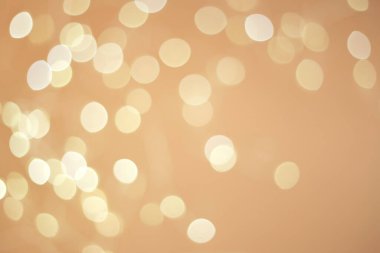 Soyut bej bokeh çözünmüş arkaplan. Parıltı.