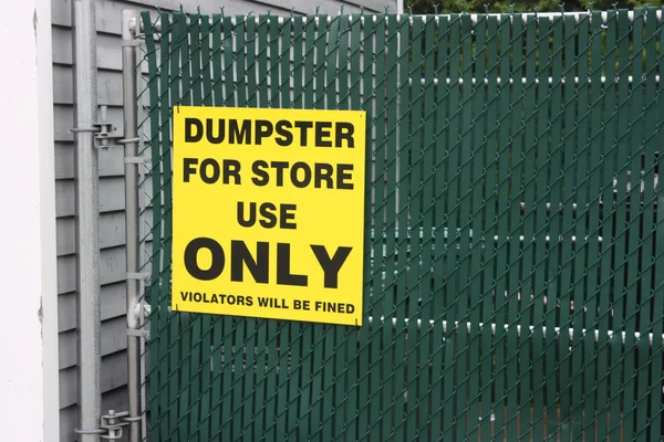 Fenced in small business Dumpster — Stock Photo, Image