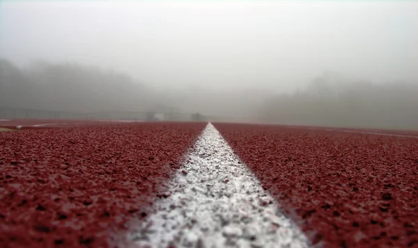 Track closeup on white line — Stock Photo, Image