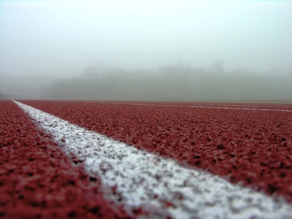 Track closeup on white line — Stock Photo, Image