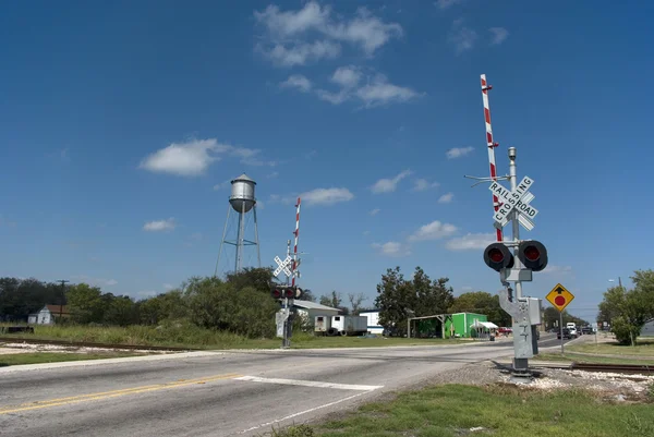 Small Town Railroad Crossing Stock Photo