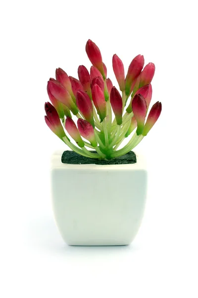 Flores vermelhas falsas no vaso — Fotografia de Stock