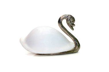 Image of swan sculpture with white shells(Ovula ovum) as part of its body. isolated on white background. Home decoration.