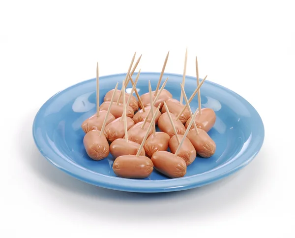 Mini sausages and toothpicks. — Stock Photo, Image