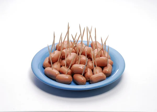 Mini sausages and toothpicks. — Stock Photo, Image