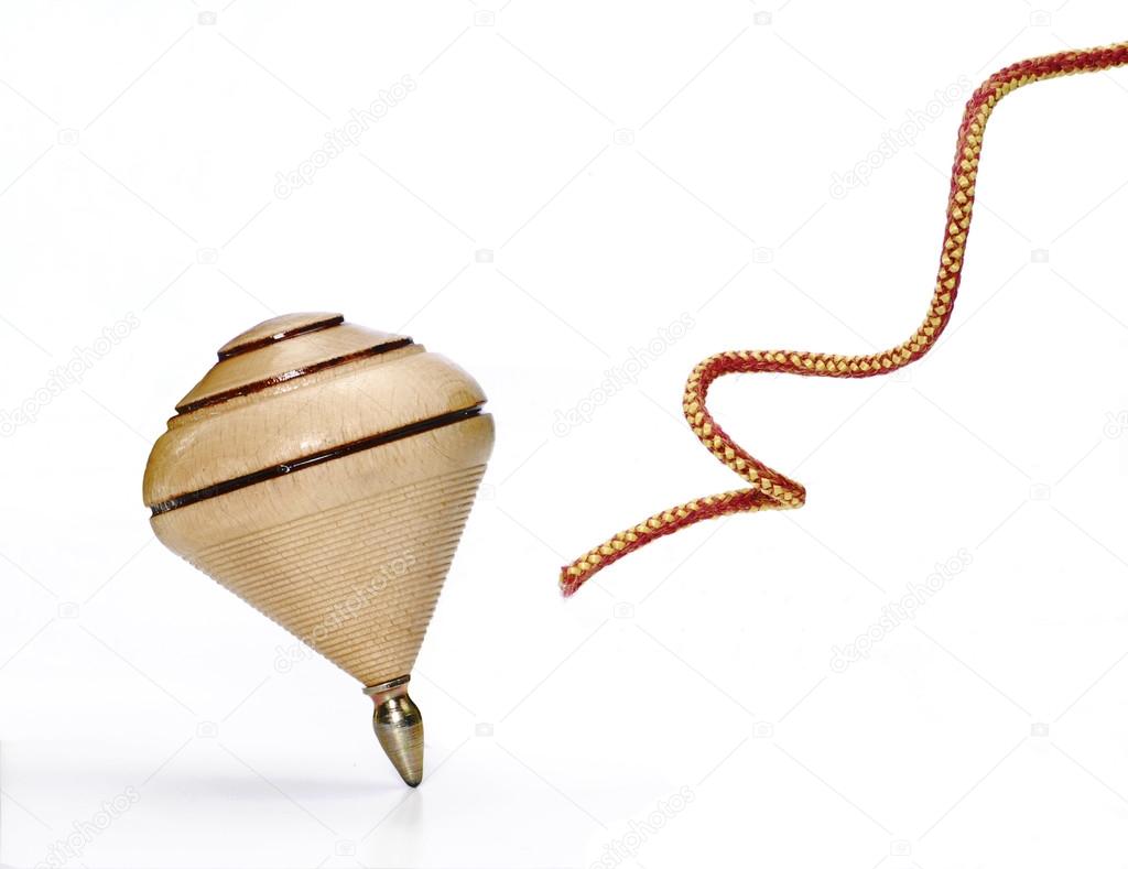 Shipley hver dag Armstrong Wood spinning top on white background and string. Stock Photo by  ©Gustavo_Andrade 13766055