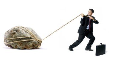 büyük bir kaya çekerek işadamı