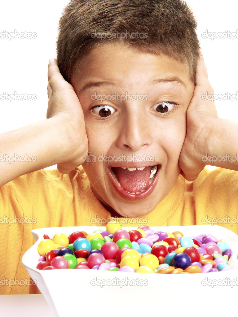 depositphotos_13773312 stock photo little boy is eating candy