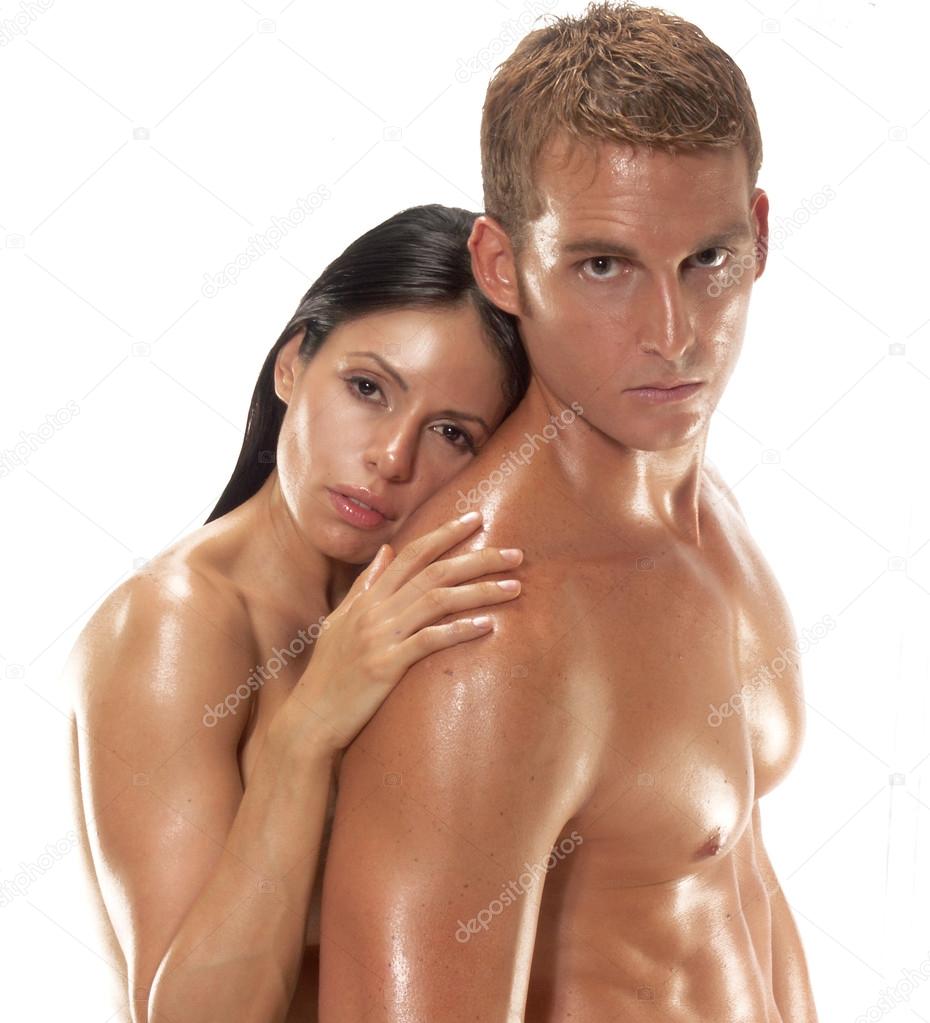 Portrait of a young undressed couple on white background.