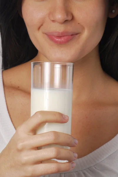 Young woman drinking milk — Stock Photo, Image