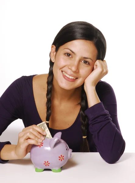 Young woman and piggy bank saving money — Stock Photo, Image