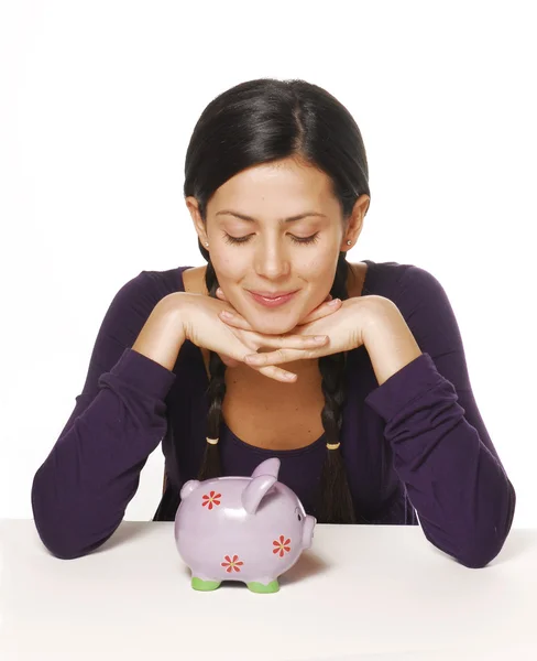 Young woman and piggy bank saving money — Stock Photo, Image