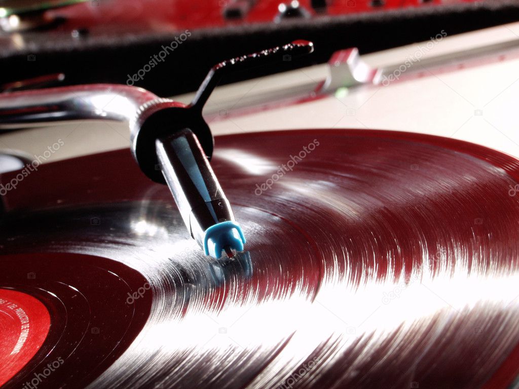 Record player spinning and vinyl disc .