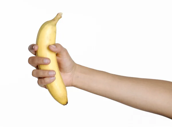 Рука тримає банан — стокове фото