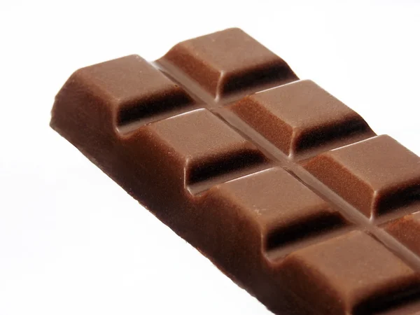 Barre de chocolat noir sur fond blanc — Photo