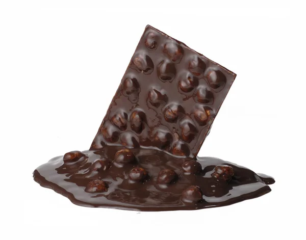 Melted chocolate nuts bar on white background