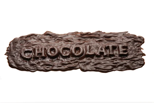 Palabra de chocolate en crema de chocolate sobre fondo blanco —  Fotos de Stock