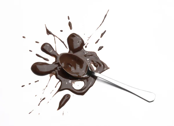 Salpicadura de cuchara de chocolate sobre fondo blanco —  Fotos de Stock