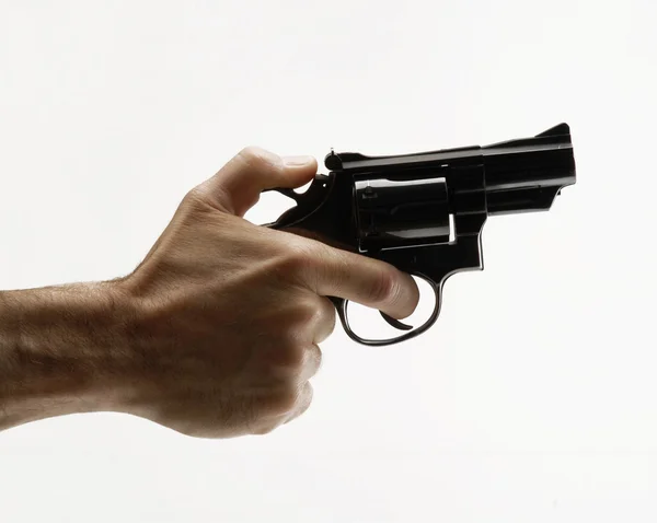 Pistola apuntando sobre fondo blanco — Foto de Stock